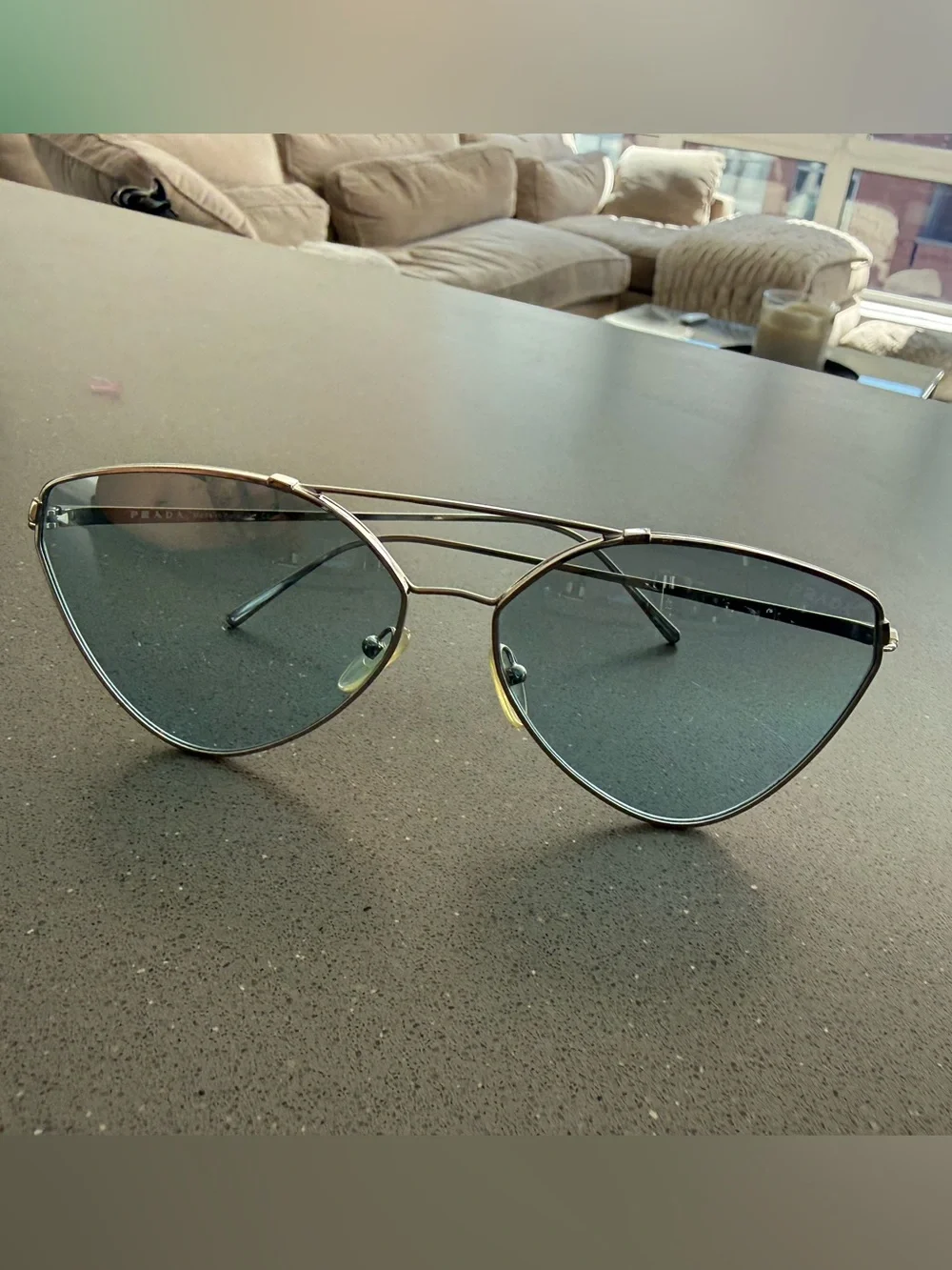 Prada Women's Cat-Eye Sunglasses in Silver with Gray Lenses